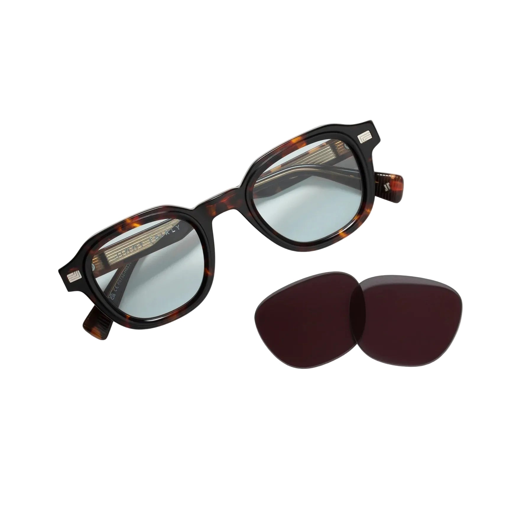 Sunglasses with tortoiseshell frame and blue lenses, accompanied by two additional lens options on a white background.